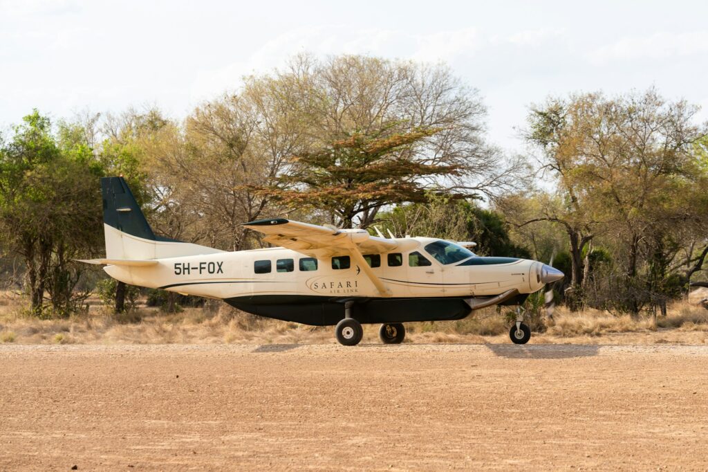 Light aircraft taking off from a Tanzanian airstrip